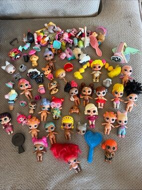 L.O.L. Surprise! Dolls Bundle with Pink, Yellow, Blue and Red Accents